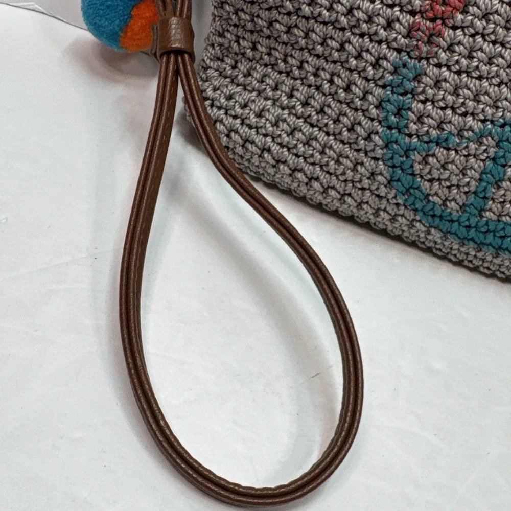 The Sak Wristlet Purse Clutch Boho Crochet Strap Zipper Pocket Grey Peace